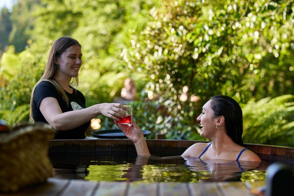 Secret Spot Rotorua Hot Tub with drinks served